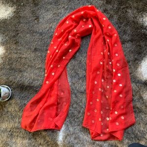 Red scarf with gold polka dots